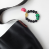 detail Ivero shoulder bag and KC bracelet